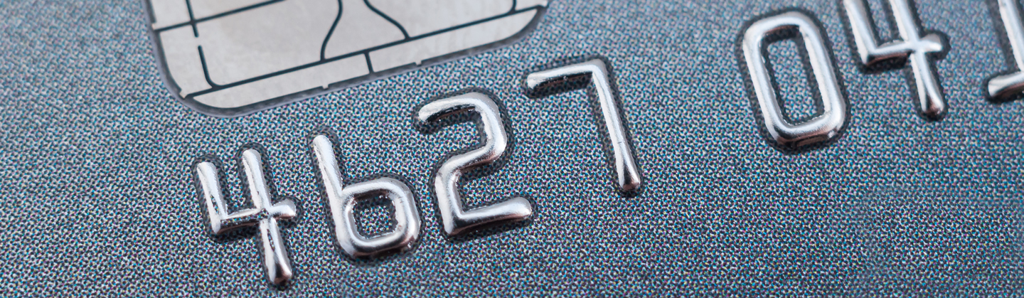 FECA -CC- Premier Visa credit-card-close-up-with-a-chip-and-numbers